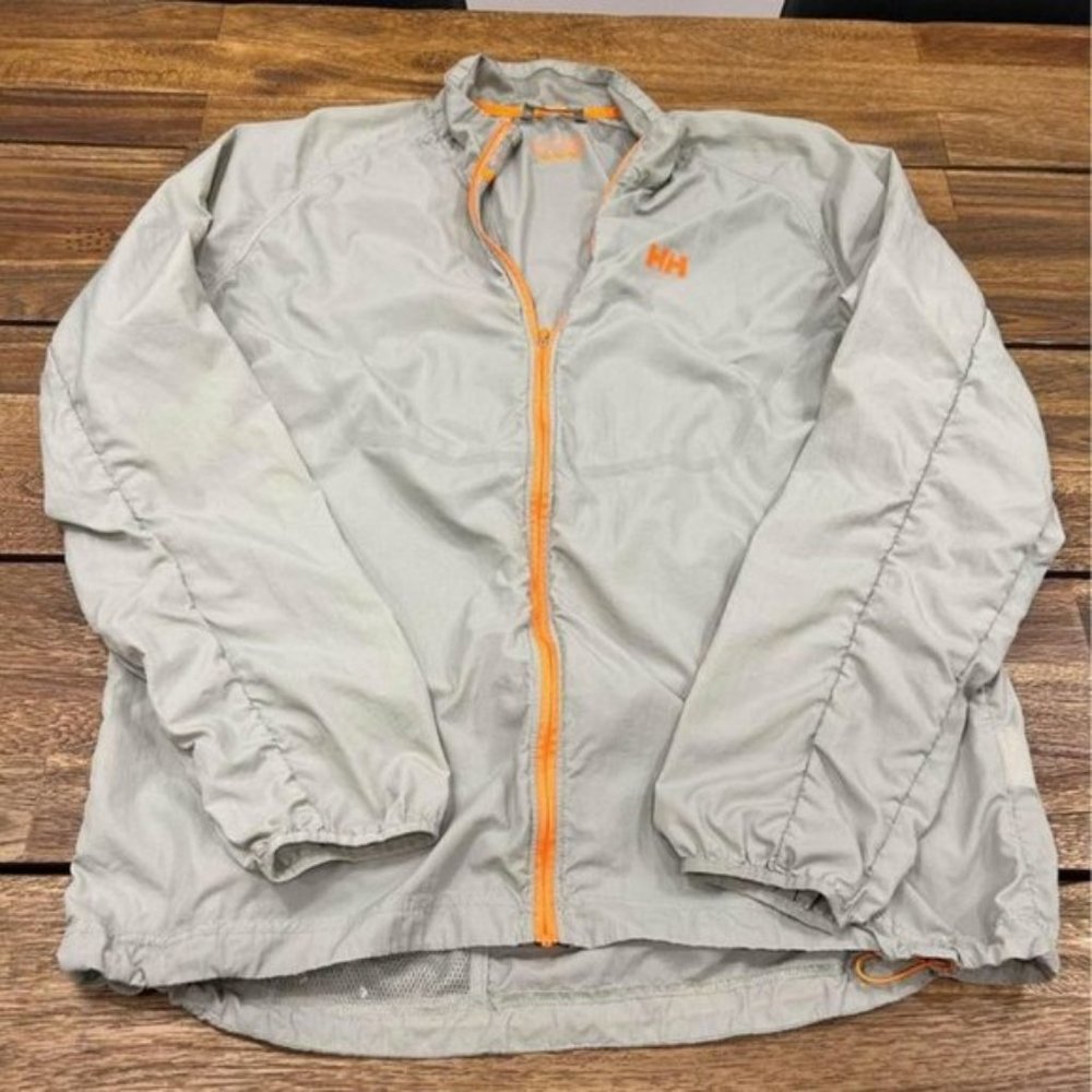 Helly HANSEN mens ultra light Packable training jacket. Size XL. Gray/orange. Go